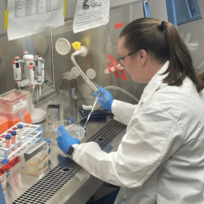 "a member of the CRC works in a lab"